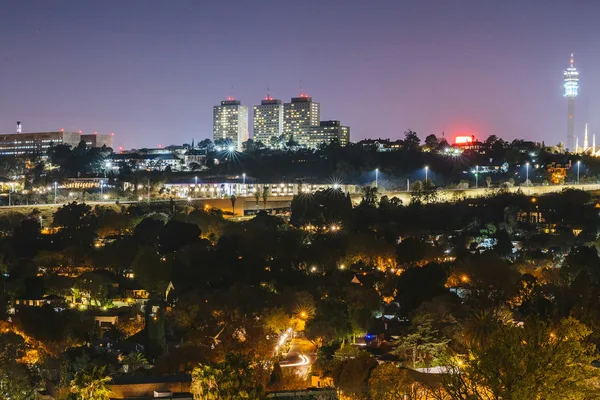 Johannesburg city skyline at night, bridging finance for property in South Africa