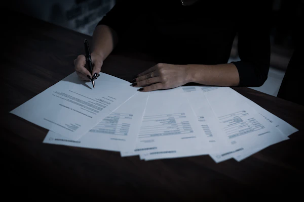 Landlord and tenant reviewing lease documents — rental deposit refund rules South Africa