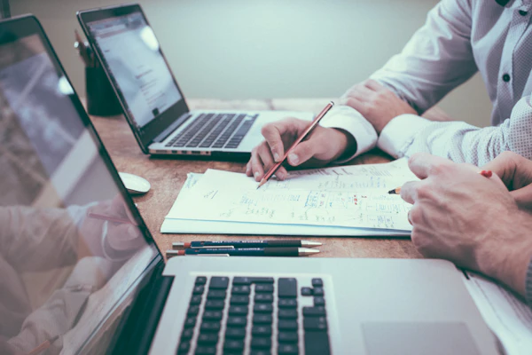 Investor reviewing property documents and plans — SA property investment checklist